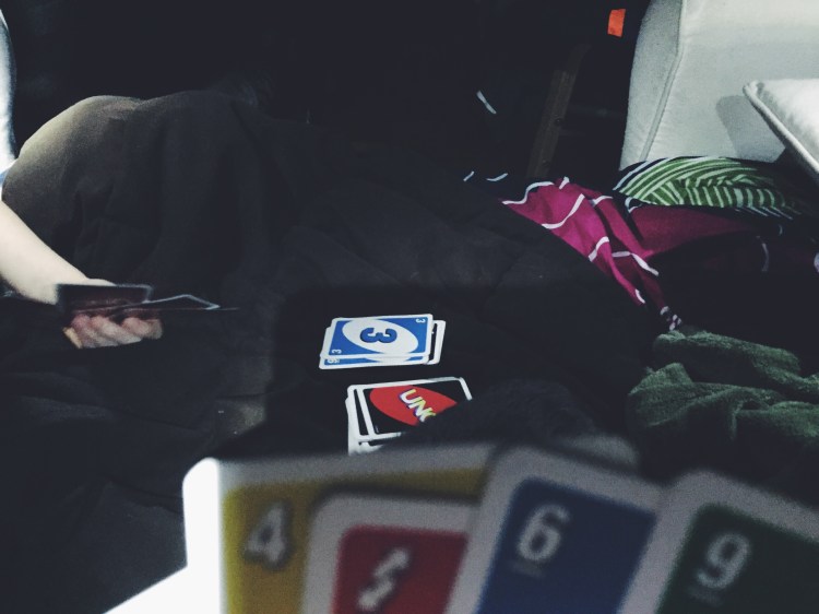 family playing uno while power is out
