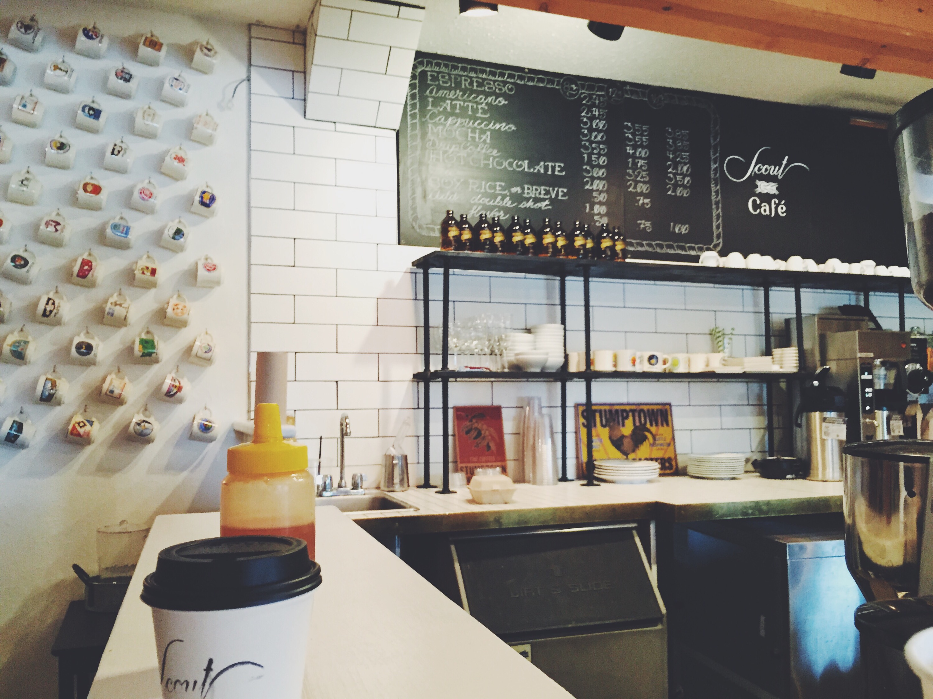 hip local coffee shop with had written chalk board signs